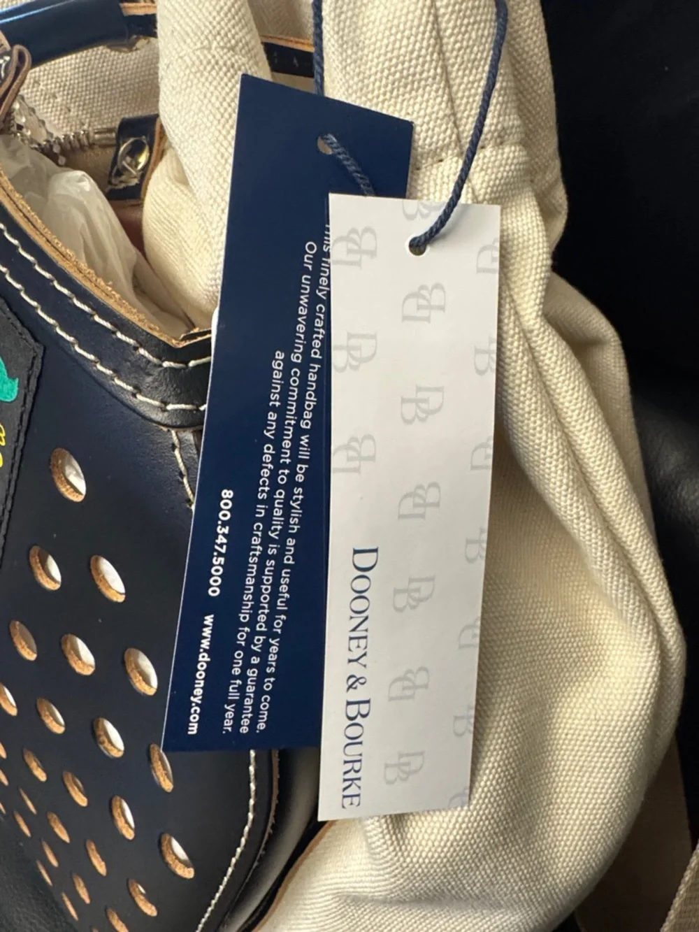 Dooney & Bourke Canvas And Leather Pickleball Sling Bag, Color Cream/Black - Picture 2 of 11